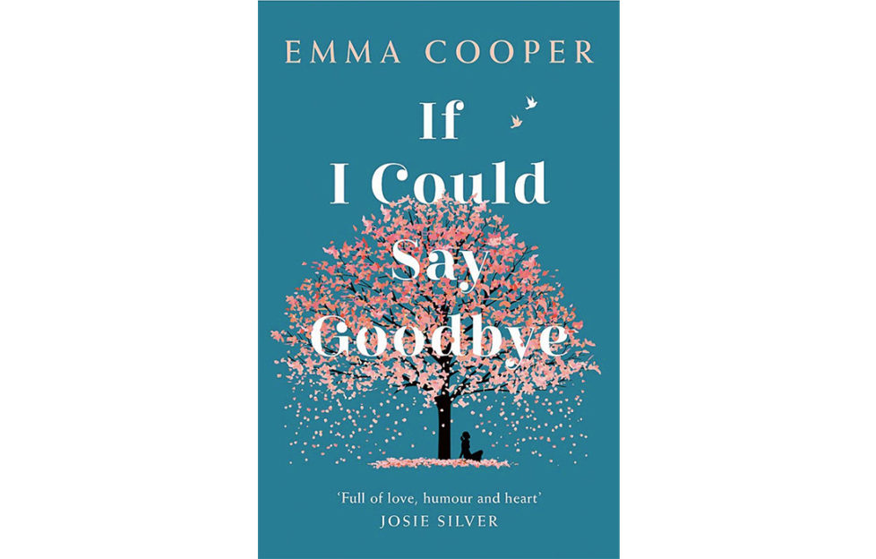 Cover of If I Could Say Goodbye. On a teal background, a woman sits under a cherry tree that is shedding its pink blossom