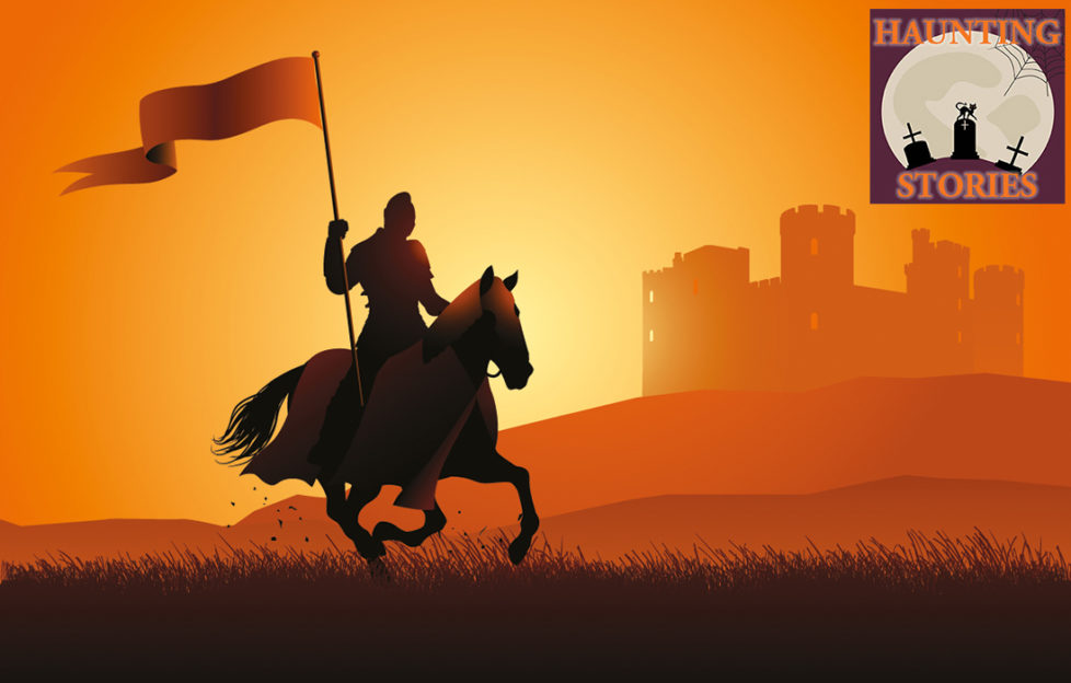 Silhouette of horseman with banner, riding past castle at sunset