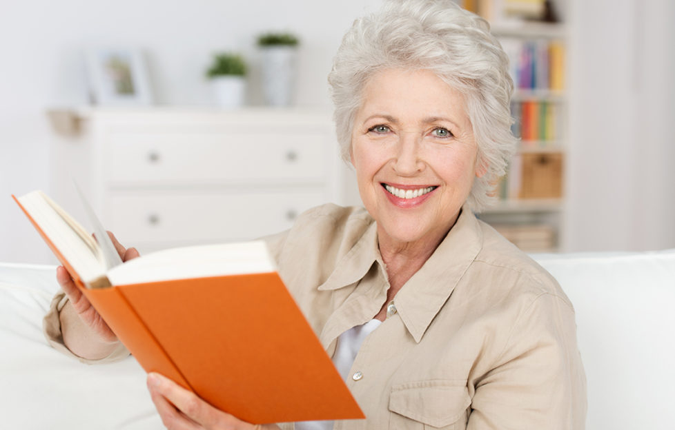 Mature lady reading a book Pic: Shutterstock
