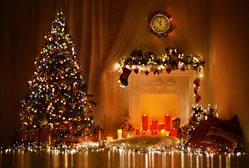 Christmas Room Interior Design, Xmas Tree Decorated By Lights Presents Gifts Toys, Candles And Garland Lighting Indoors Fireplace;