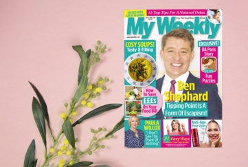 Cover of My Weekly latest issue with Ben Shephard and soup recipes, on pink background with a branching stalk of small yellow flowers