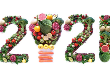 2021 made of fruits and vegetables including a light bulb icon;