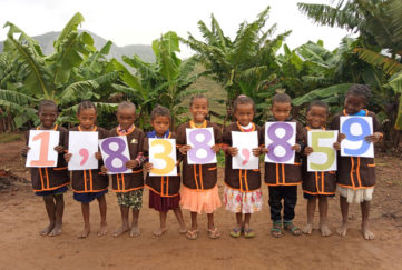Children from Ankarinomby Primary School in Madagascar celebrate Mary’s Meals feeding 1.8 million children