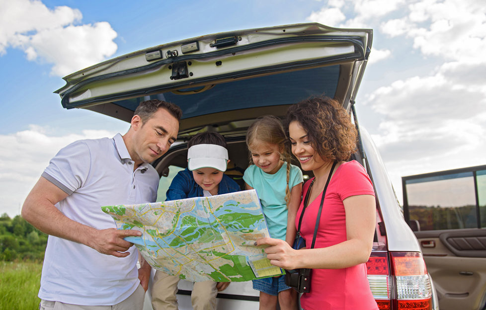 Happy family enjoying road trip and summer vacation; Shutterstock ID 471296090