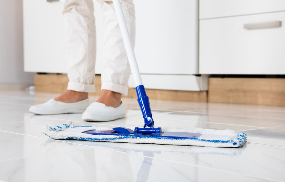 Cleaning Service Woman Mopping The Floor In Kitchen At Home;