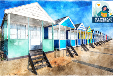 A watercolour painting of a row of colourful beach huts under a deep blue sky at Southwold in Suffolk