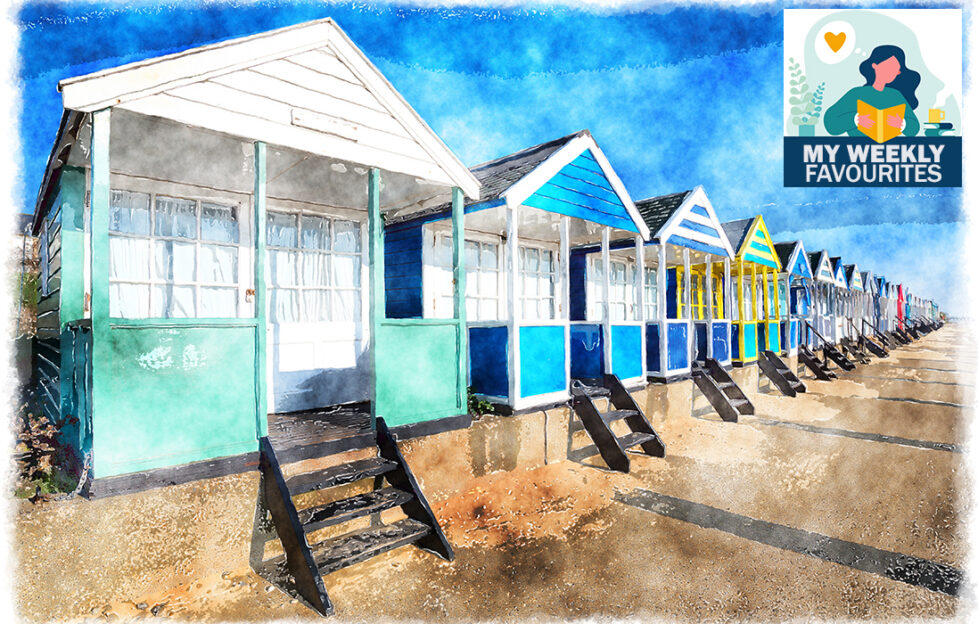 A watercolour painting of a row of colourful beach huts under a deep blue sky at Southwold in Suffolk