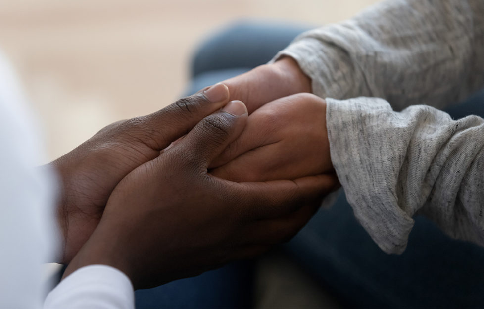 2 people holding hands, comfort, empathy