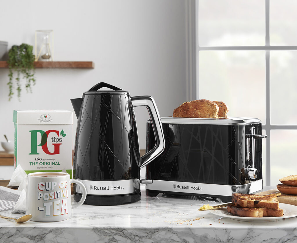 Russell Hobbs black kettle and toaster with PG tips box of tea bags