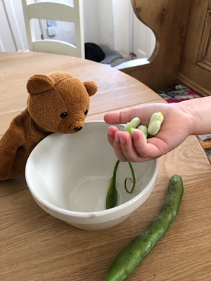 George shelling beans