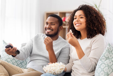 Couple watching movie at home Pic: Shutterstock