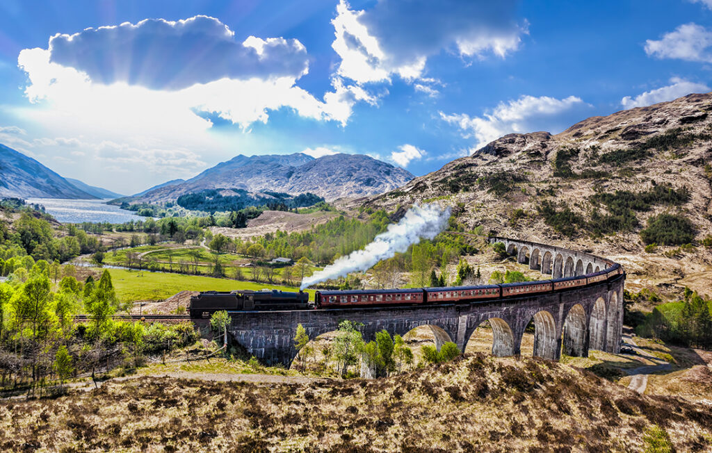 Glenfinnan Railway Viaduct in Scotland with the Jacobite steam train against sunset  Pic: Shutterstock