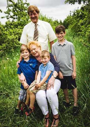 Tony and Joan with their grandchildren