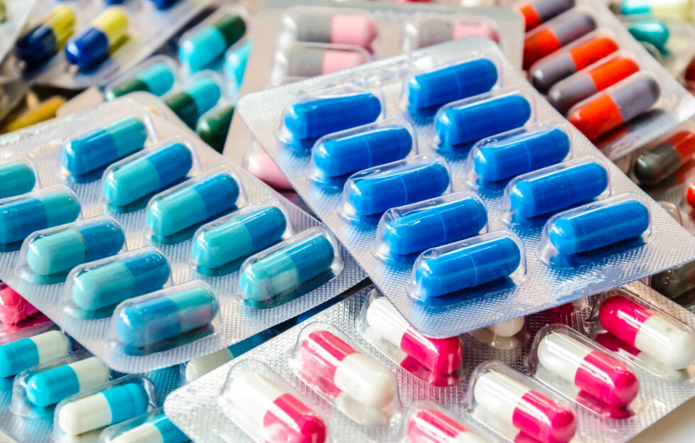 pharmaceuticals antibiotics pills medicine /colorful antibacterials pills on white background /capsule pill medicine ;