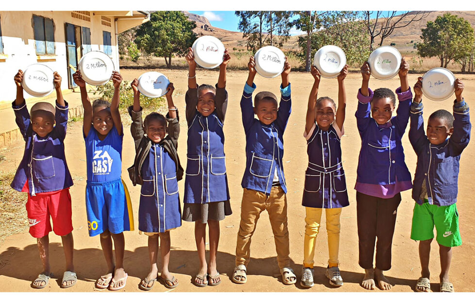 Children celebrating Mary's Meals success in madagascar Pic: Chris Watt
