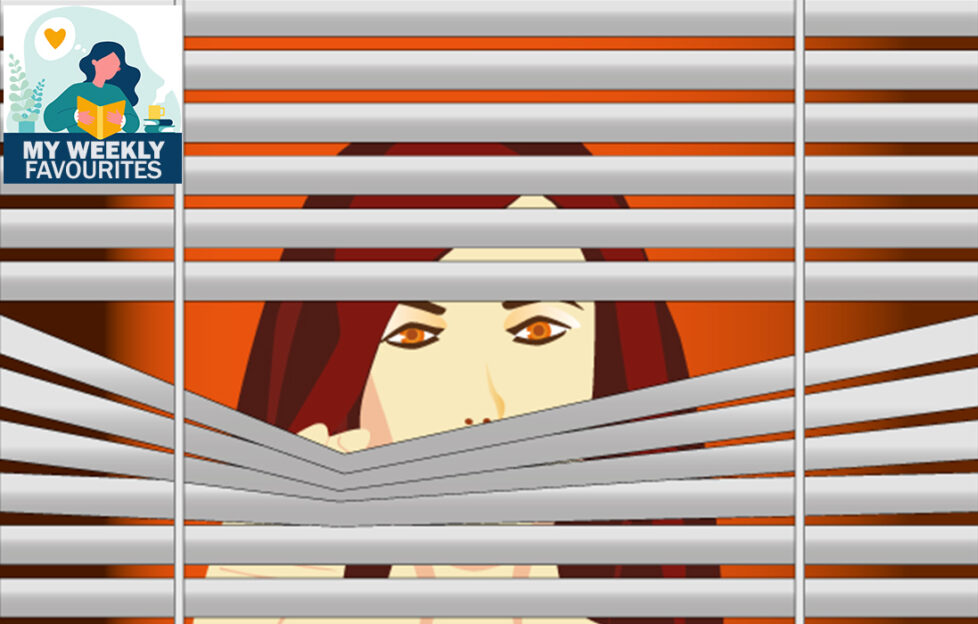 Woman looks through venetian blind