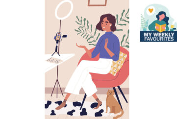 Woman doing a piece to video camera with cat by her side Illustration: Shutterstock