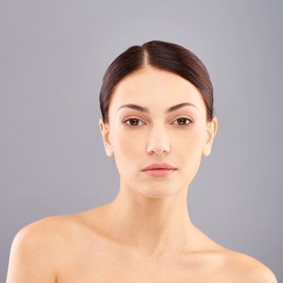 Studio shot of enigmatic woman