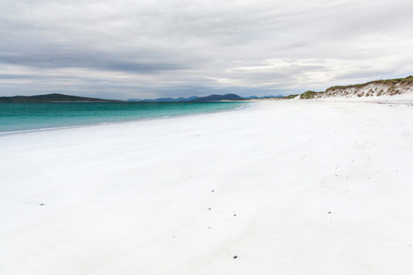White, sandy, deserted beach in the Outer Hebrides. Western Isles, Scotland. One of the best beaches in Scotland.