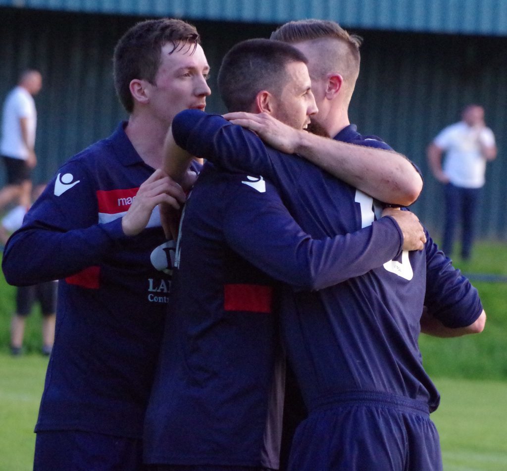 Donald Campbell is
 congratulated after giving Saints a 2-1 lead.