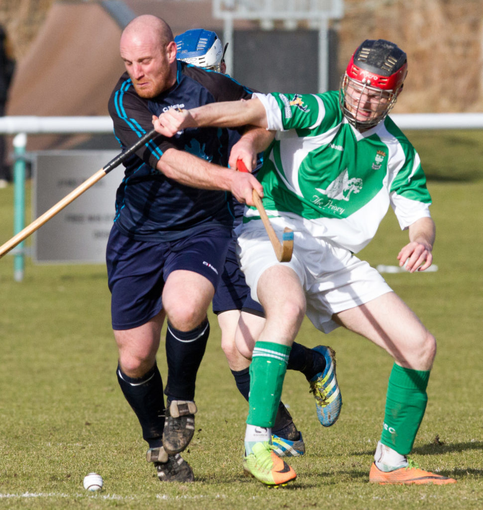 Skye’s Kenny Campbell and Beauly’s Robbie MacDonald fight for the ball. Photograph: Donald Cameron.