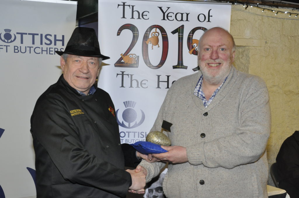 John Ackroyd picked up last year's Golden Haggis on behalf of McCaskie Butchers from Keith Fisher from the Institute of Meat.