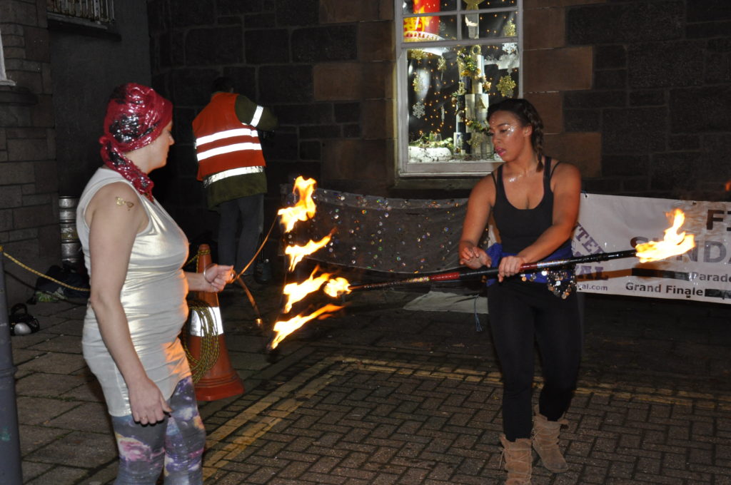 'Funky Chicken' entertainers perform with fire at Oban Distillery. 17_T48_WinterFestivalSunday09