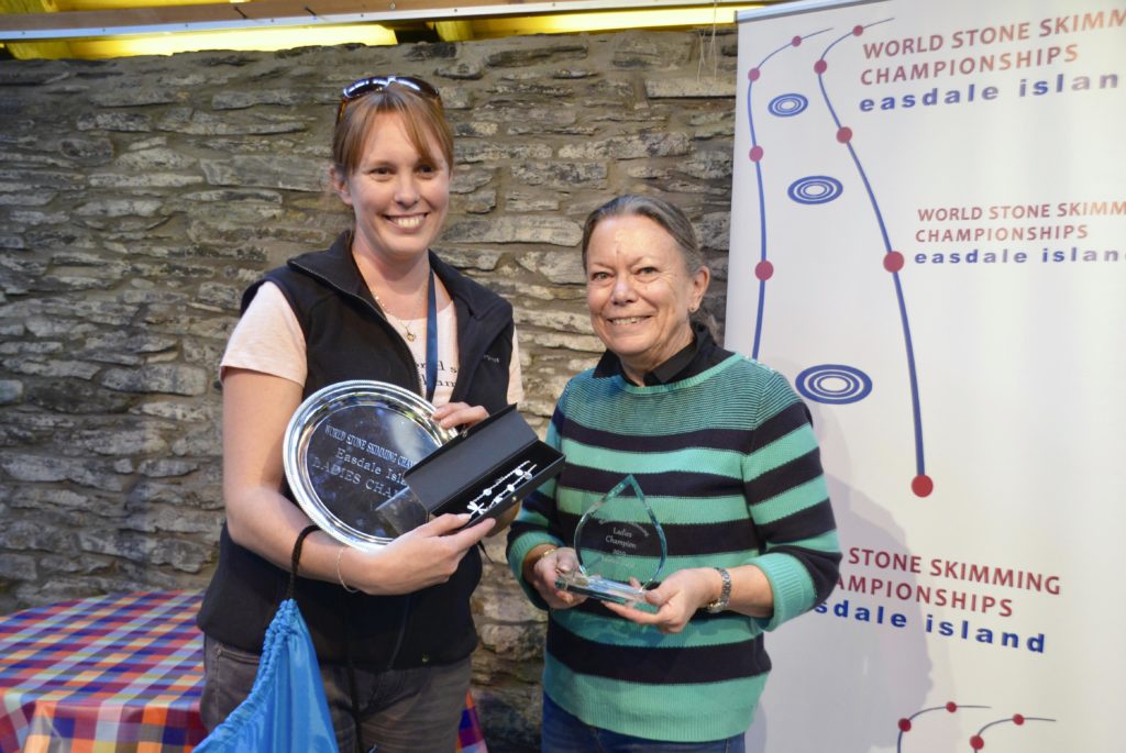 Ladies champion receiving her prize from category sponsor Margaret Temlett of Northern Retail. Margaret also made the silver necklace presented to our winning lady. Photograph: Jordan Young of LoveLiveRun.