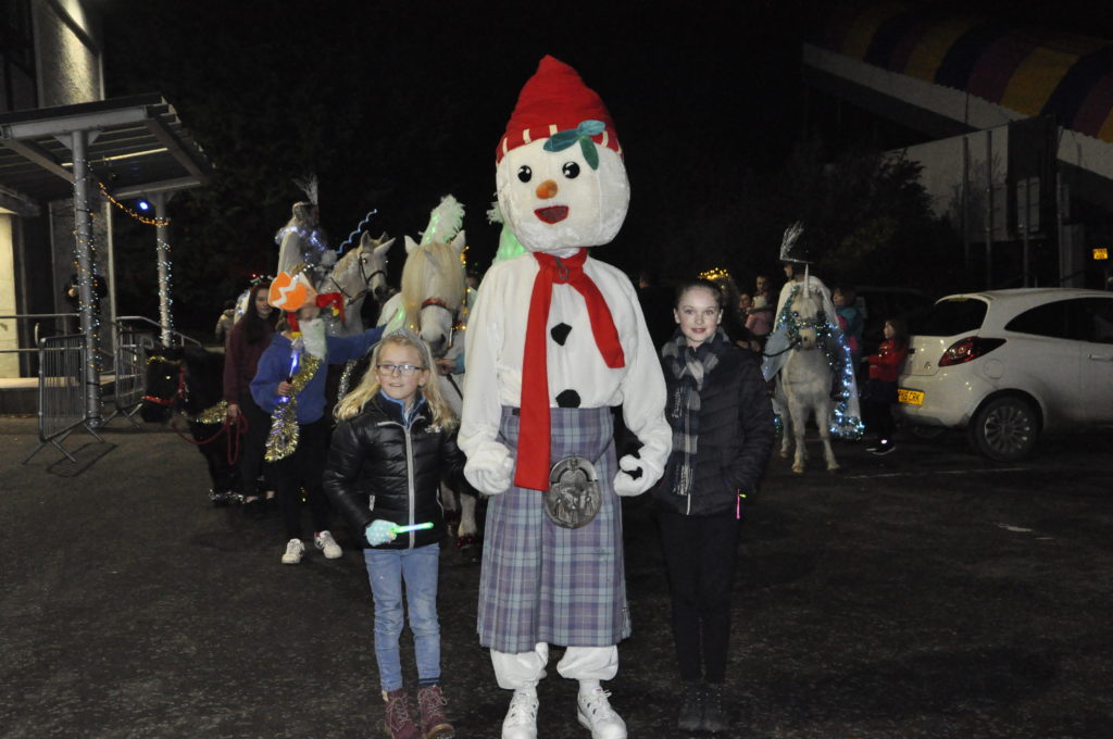 Frosty the Snowman gets ready for the opening night parade.