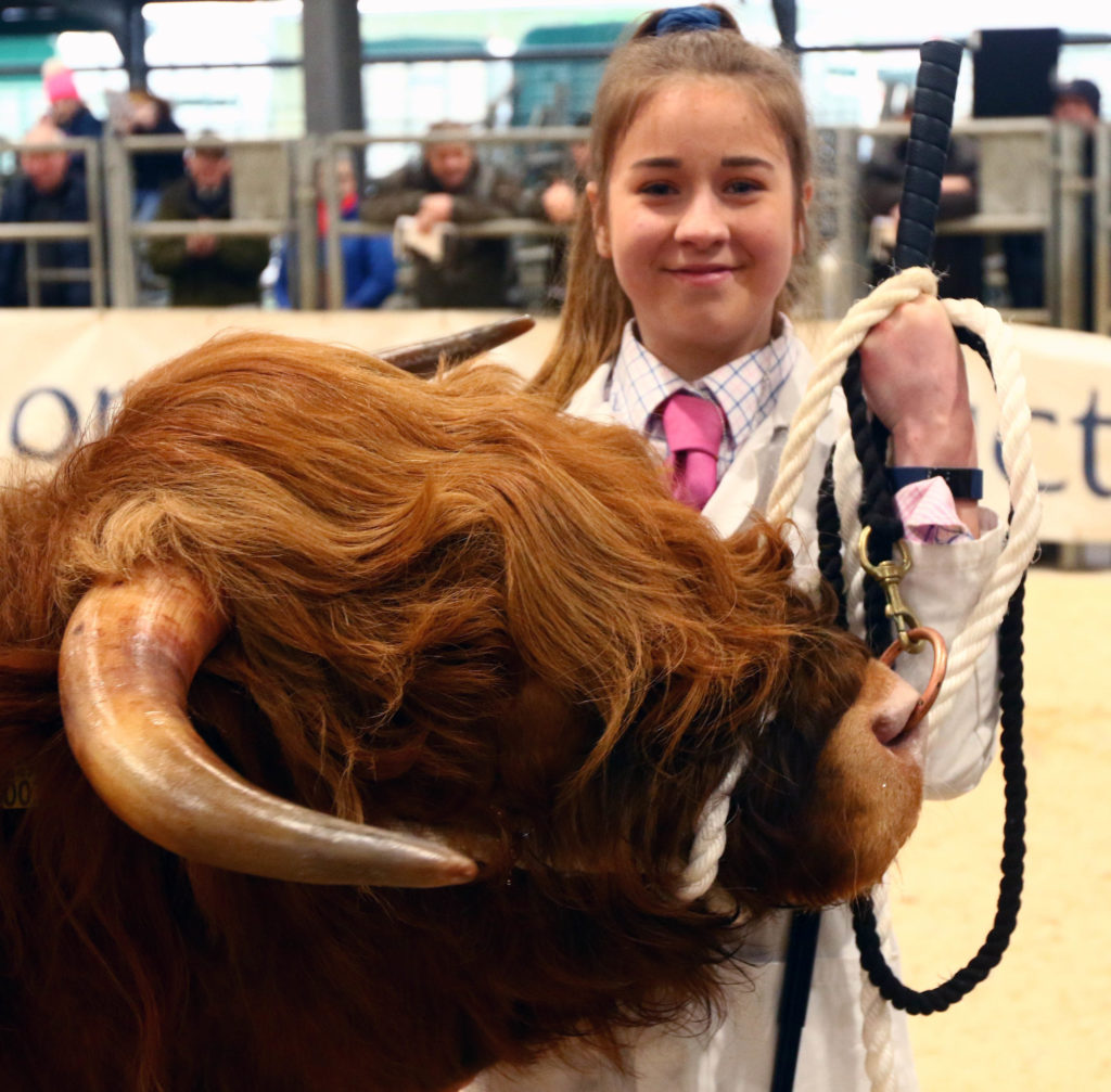 A delighted Emily Armstrong, from Tiree, who was the winner of the overall young handler competition. NO_T07_HighlandCattleShow04_Photograph-Kevin-McGlynn