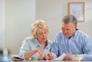 Senior couple making a will