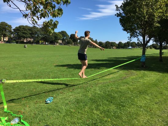 Boy on a tightrope.