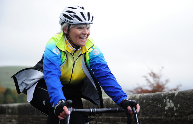 lady on a bike fat lad at the back