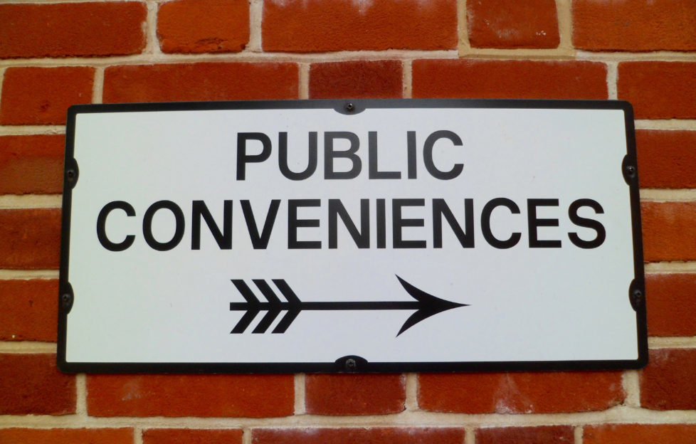 'Public Conveniences' Sign & Arrow Symbol