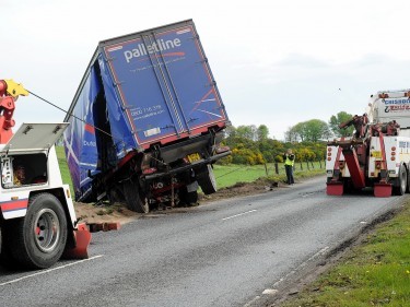 The lorry ended up in a field just off the A96