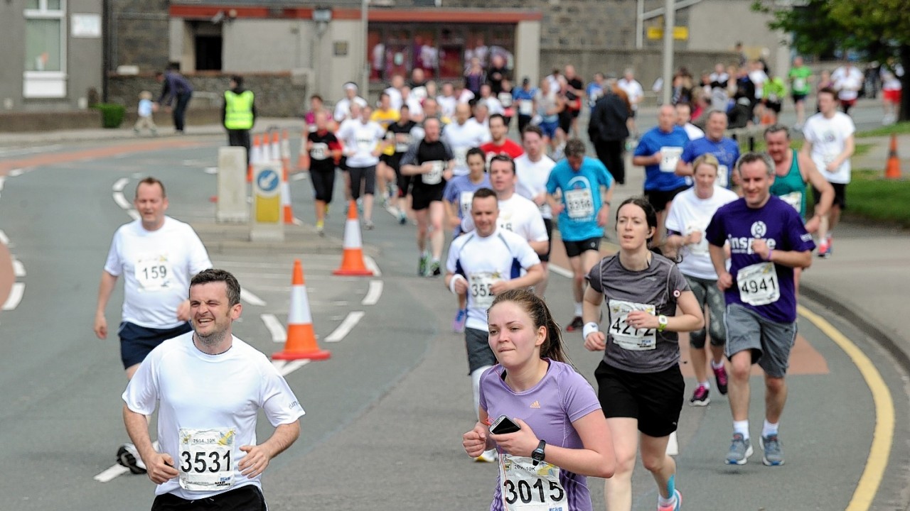 Runners taking part in the Baker Hughes 10k race at Aberdeen Beach on Sunday
