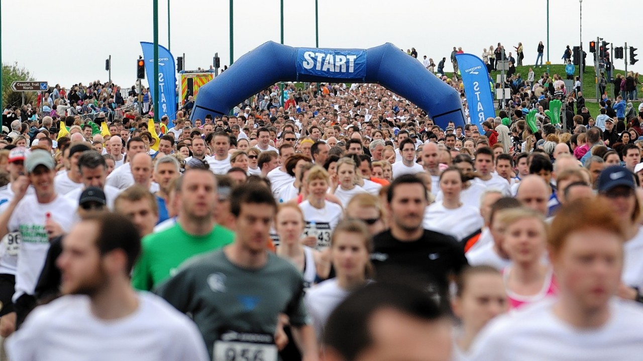Runners taking part in the Baker Hughes 10k race at Aberdeen Beach on Sunday