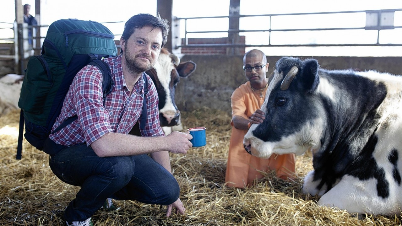 Dom Dwight from Taylors of Harrogate with monk, Radha Govinda, at the Hare Krishna Cow Protection Sanctuary at Gokul Farm, Bhaktivedanta Manor in Aldenham, in search of ingredients for the world's best coffee.