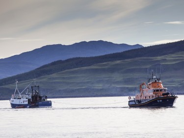 Fishing vessel under tow by Tobermory lifeboat
