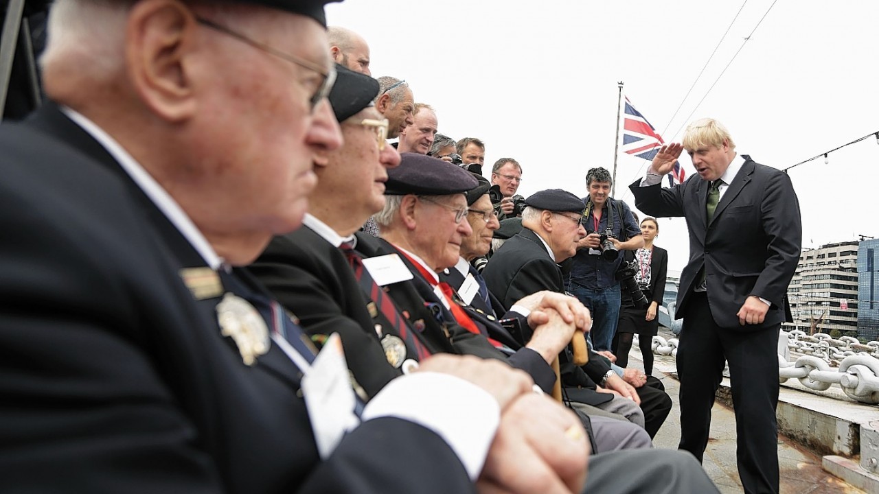 Mayor of London Boris Johnson meeting D-Day Veterans onboard the Second World War warship HMS Belfast in London, during a ceremony to mark the 70th anniversary of the historic Normandy Landings