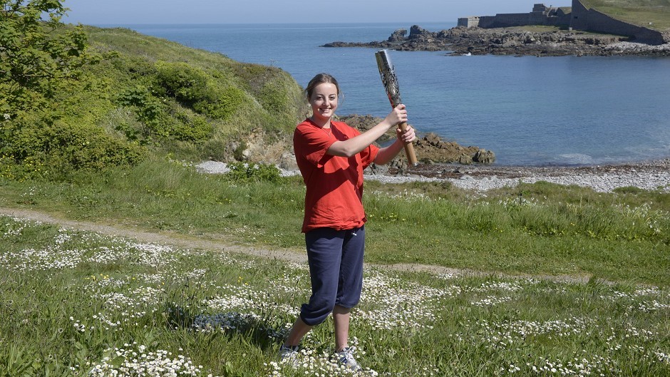 Emma Etheredge, 15, carried the Queen's Baton as it made its way round the Channel Island of Alderney earlier this week (Ben Birchall for Glasgow 2014/PA Wire)