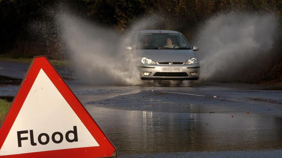 The A9 has been closed after flash floods hit the region