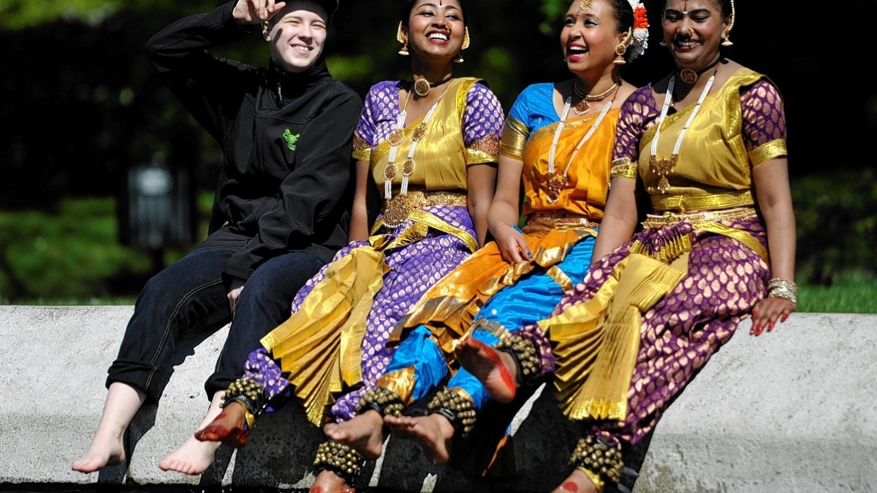 Dancers from the Abhinaya dance group at Kelvingrove Park as Commonwealth Games recruits are to be given a test run at Glasgow’s Mela festival