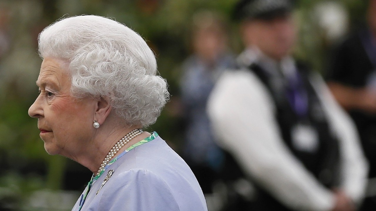 Queen Elizabeth II looks at a display during a visit to the Chelsea Flower Show