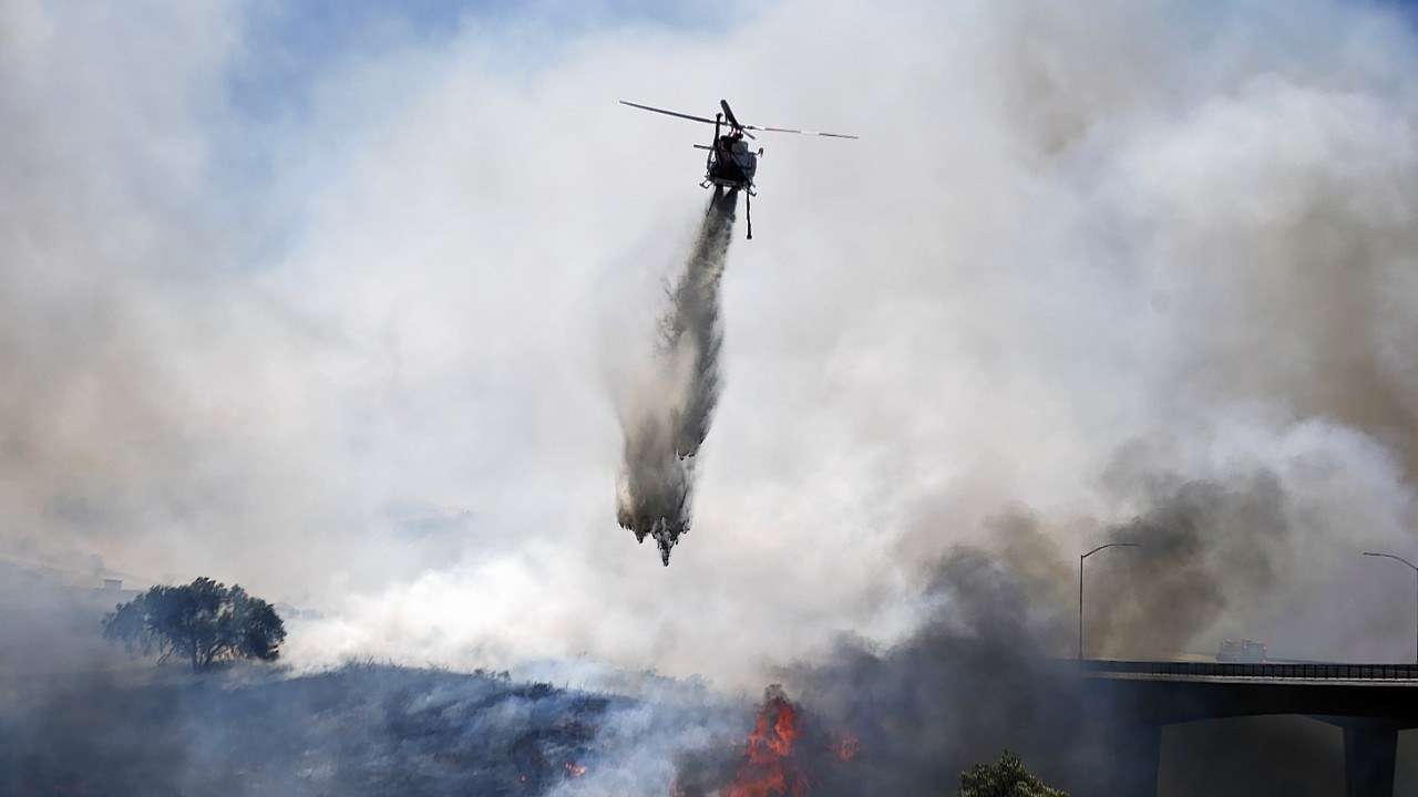 Dramatic images as US emergency services battle to put out a fire near San Diego