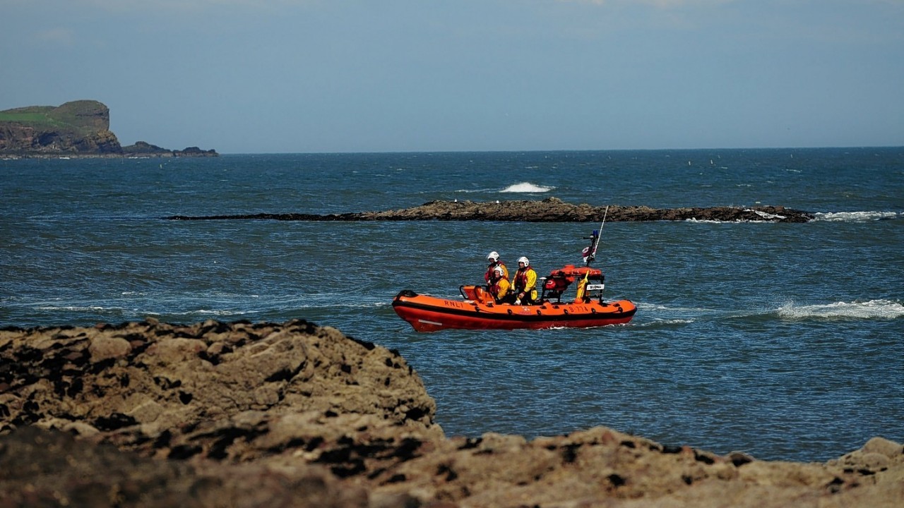 An RNLI lifeboat as the search continues on the east coast of north sea near Gourdon, Aberdeenshire