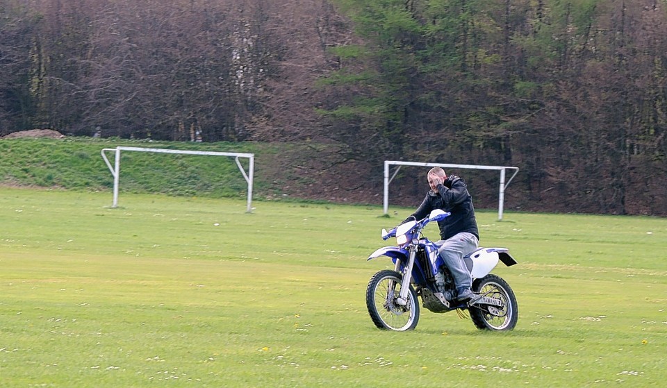 A young motorcyclist in Sheddocksley Playing Fields earlier this year