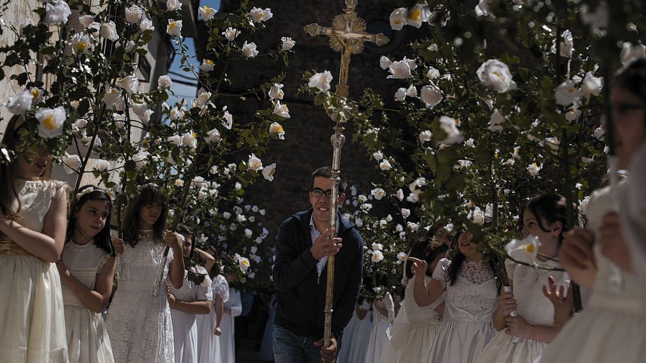 Teenagers dressed in bridal white take part in the pilgrimage "The Hundred Maidens" in Sorzano, northern Spain