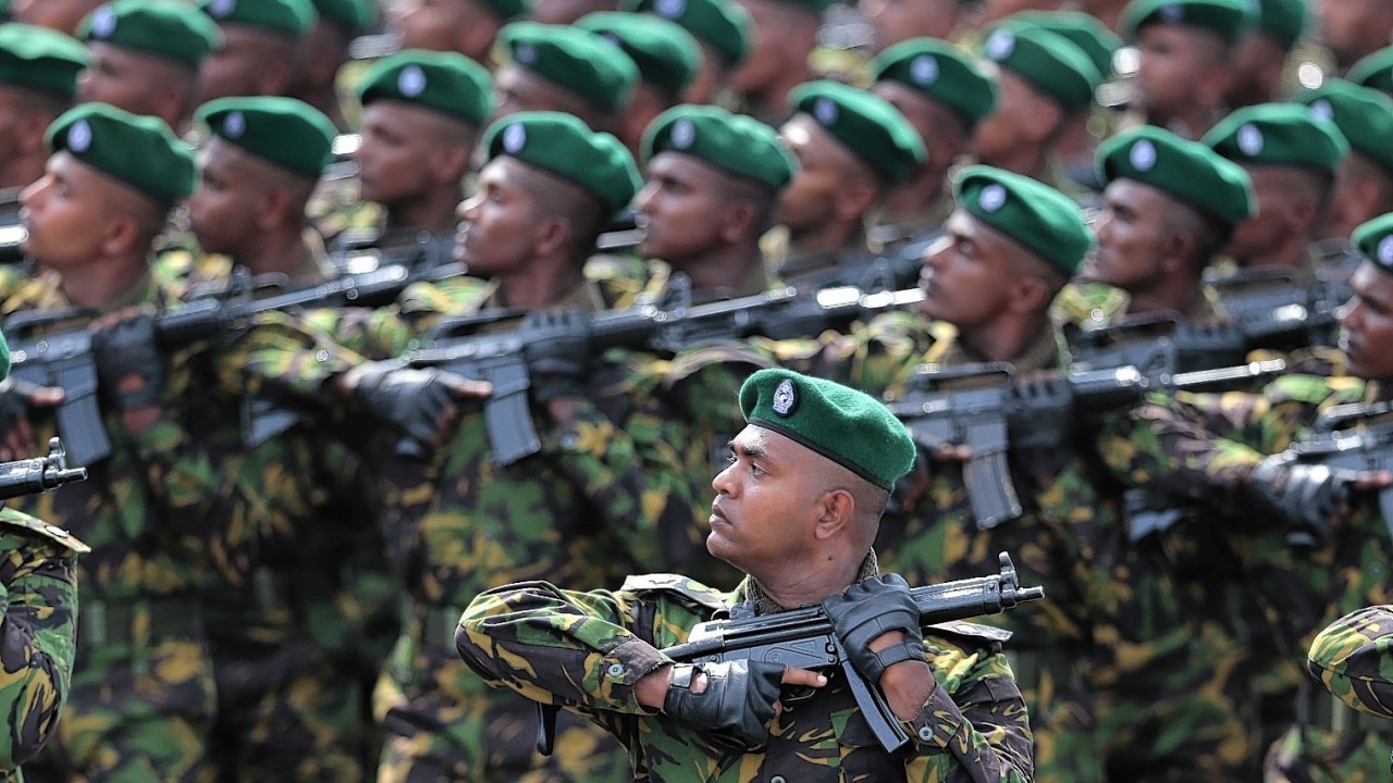 Sri Lankan army soldiers march during a Victory Day parade in Matara, about 150 kilometers (94 miles) south of Colombo, Sri Lanka