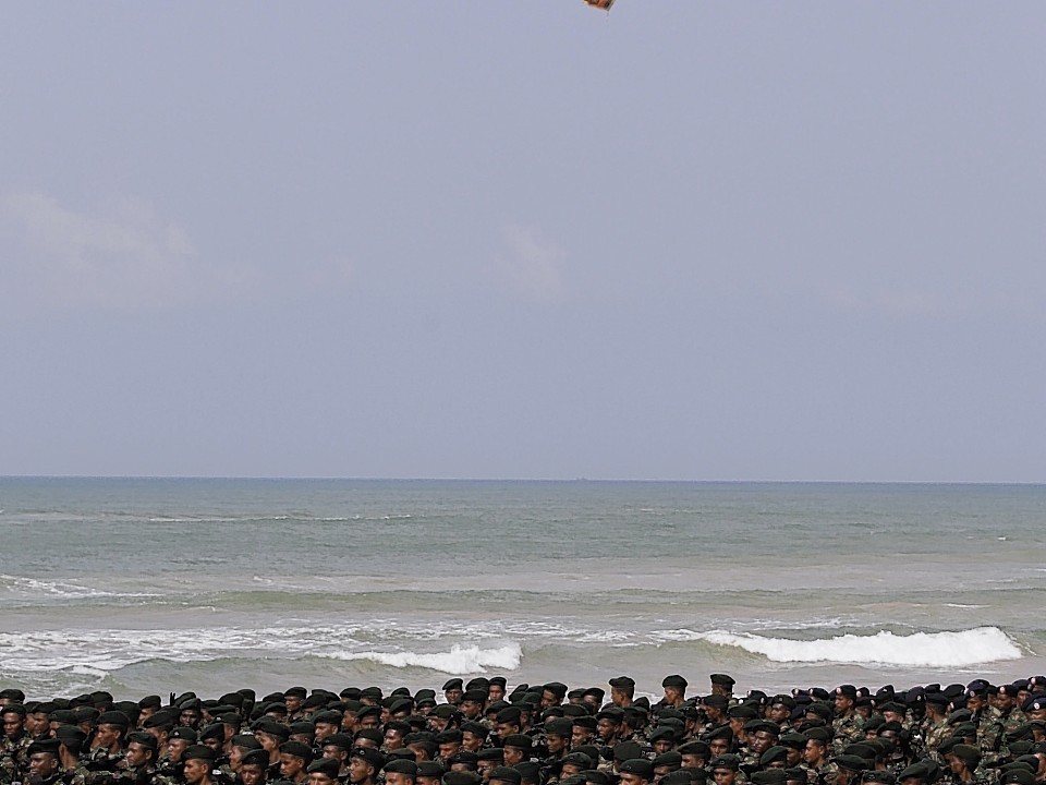 Sri Lankan army soldiers march during a Victory Day parade in Matara, about 150 kilometers (94 miles) south of Colombo, Sri Lanka